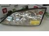 Headlight, left from a Ford Mondeo III, Hatchback, 2000 / 2007 2003