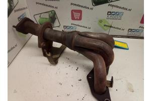 Used Exhaust manifold Ford Mondeo III Wagon 1.8 16V Price € 50,00 Margin scheme offered by Autodemontagebedrijf R. Poeste B.V.