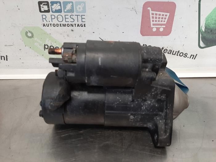Starter from a Renault Clio III (BR/CR) 1.5 dCi 70 2006