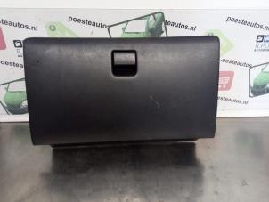Used Glovebox Daihatsu Sirion/Storia (M1) 1.0 12V Price € 20,00 Margin scheme offered by Autodemontagebedrijf R. Poeste B.V.