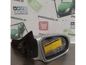 Used Wing mirror, right Opel Corsa B (73/78/79) 1.4i Price € 10,00 Margin scheme offered by Autodemontagebedrijf R. Poeste B.V.