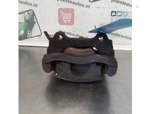 Used Front brake calliper, left Fiat Grande Punto (199) 1.4 Price € 30,00 Margin scheme offered by Autodemontagebedrijf R. Poeste B.V.