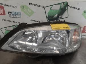 Używane Reflektor lewy Opel Astra G (F08/48) 1.6 16V Cena € 10,00 Procedura marży oferowane przez Autodemontagebedrijf R. Poeste B.V.