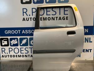 Usagé Portière 4portes arrière gauche Opel Agila (A) 1.2 16V Prix € 60,00 Règlement à la marge proposé par Autodemontagebedrijf R. Poeste B.V.
