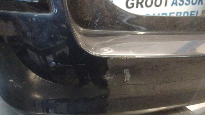 Rear bumper from a Opel Astra H SW (L35) 1.6 16V Twinport 2006