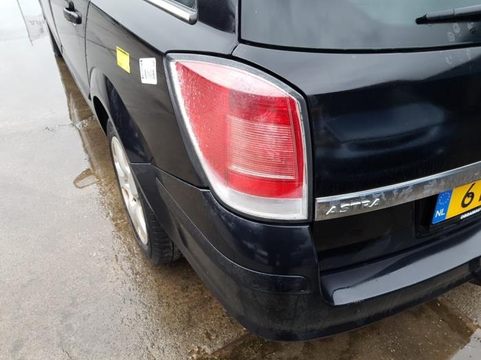 Rear bumper from a Opel Astra H SW (L35) 1.6 16V Twinport 2006