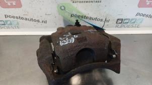 Used Front brake calliper, left Ford Fiesta 6 (JA8) 1.6 16V Sport Price € 30,00 Margin scheme offered by Autodemontagebedrijf R. Poeste B.V.