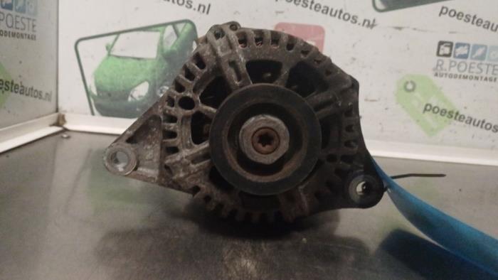 Usagé Dynamo Nissan Micra (K12) 1.2 16V Prix € 30,00 Règlement à la marge proposé par Autodemontagebedrijf R. Poeste B.V.
