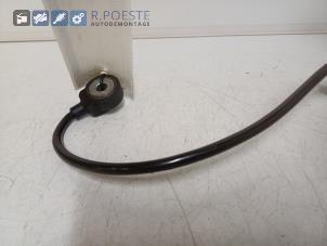 Klopfsensor van een Chevrolet Captiva (C100) 2.4 16V 4x2 2008