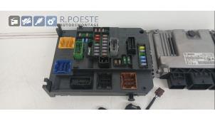 Engine management computer from a Peugeot 508 SW (8E/8U) 1.6 THP 16V 2012