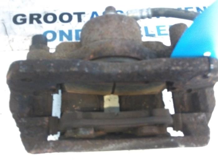 Front brake calliper, right from a Mazda 626 (GW19) 2.0i 16V HiPower 2001