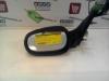 Wing mirror, left from a Renault Clio (B/C57/357/557/577), 1990 / 1998 1.4 RN,RT,S,Autom.Kat., Hatchback, Petrol, 1.390cc, 57kW (77pk), FWD, E7JF710; E7JF711, 1994-03 / 1996-04, B57B; C57B 1995