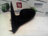 Wing mirror, left from a Renault Clio (B/C57/357/557/577) 1.4 RN,RT,S,Autom.Kat. 1995