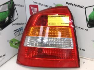 Used Taillight, left Opel Astra Price € 20,00 Margin scheme offered by Autodemontagebedrijf R. Poeste B.V.
