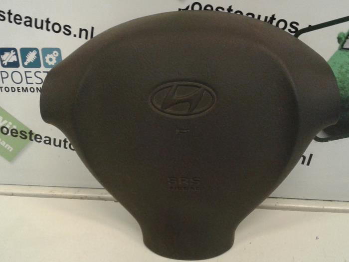 Left airbag (steering wheel) from a Hyundai Santa Fe I 2.7 V6 24V 4x4 Autom. 2001
