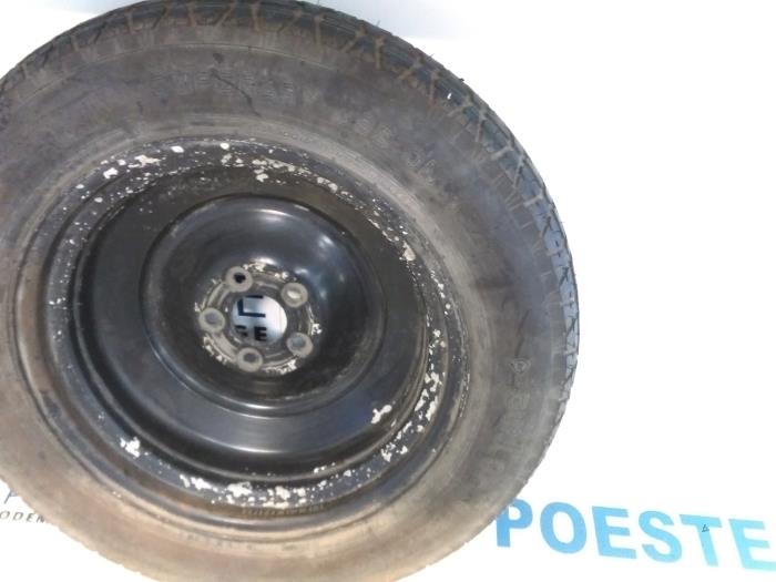 Space-saver spare wheel from a Mercedes-Benz ML I (163) 320 3.2 V6 18V Aut.Kat. 1998