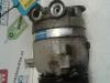 Air conditioning pump from a Daewoo Tacuma, 2000 1.8 Pure,SE,SX, MPV, Petrol, 1.798cc, 66kW (90pk), FWD, F18D2, 2000-09 / 2005-01, KLAU 2000