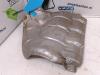 Exhaust heat shield from a Renault Clio II (BB/CB), 1998 / 2016 1.6 16V, Hatchback, Petrol, 1.598cc, 79kW (107pk), FWD, K4M708; K4M748, 2001-06 / 2003-12, BB0H; BB1D; CB1D 2003