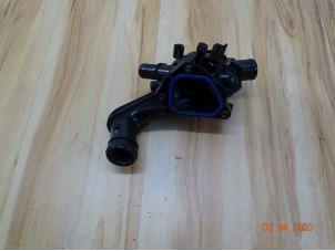 Used Thermostat housing Mini Mini (R56) 1.6 16V Cooper S Price € 60,00 Margin scheme offered by Miniparts24 - Miniteile24 GbR