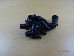 Used Thermostat housing Mini Mini (R56) 1.6 16V Cooper S Price € 39,50 Margin scheme offered by Miniparts24 - Miniteile24 GbR