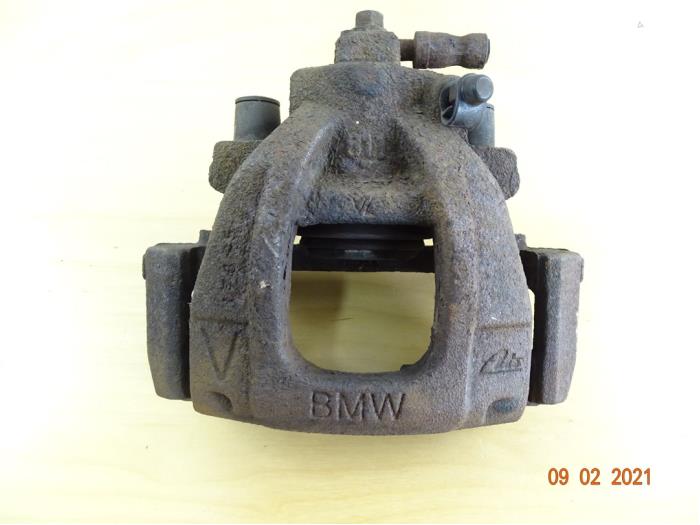 Front brake calliperholder, left from a MINI Mini Cooper S (R53) 1.6 16V 2005