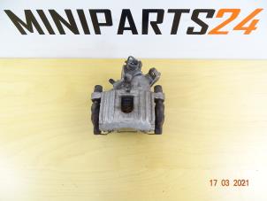 Used Rear brake calliperholder, left BMW Mini One/Cooper (R50) 1.6 16V Cooper Price € 77,35 Inclusive VAT offered by Miniparts24 - Miniteile24 GbR