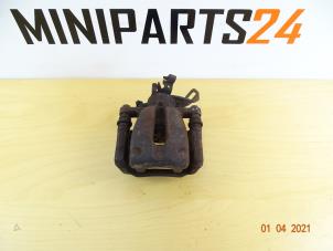 Used Rear brake calliperholder, left Mini Mini (R56) 1.6 16V Cooper Price € 35,70 Inclusive VAT offered by Miniparts24 - Miniteile24 GbR