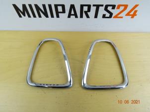 Used Taillight edging, left Mini Mini (R56) 1.4 16V One Price € 59,38 Inclusive VAT offered by Miniparts24 - Miniteile24 GbR