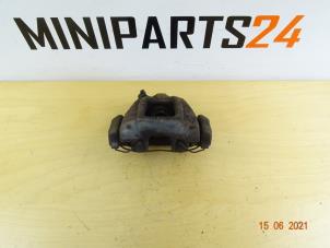 Used Front brake calliperholder, left BMW Mini One/Cooper (R50) 1.6 16V Cooper Price € 35,58 Inclusive VAT offered by Miniparts24 - Miniteile24 GbR