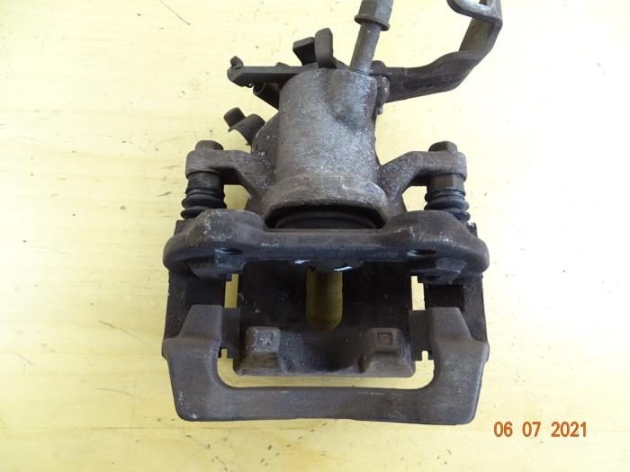 Rear brake calliperholder, right from a Mini ONE 2015