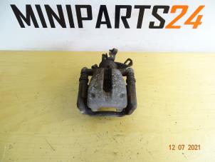 Used Rear brake calliperholder, left Mini Mini (R56) 1.6 16V Cooper Price € 41,65 Inclusive VAT offered by Miniparts24 - Miniteile24 GbR