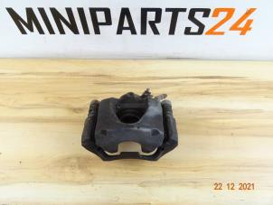 Used Front brake calliperholder, left Mini Cooper Price € 89,25 Inclusive VAT offered by Miniparts24 - Miniteile24 GbR