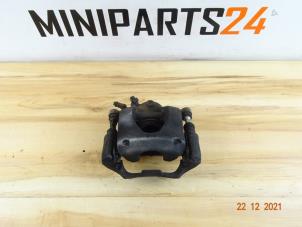 Used Front brake calliperholder, right Mini Cooper Price € 89,25 Inclusive VAT offered by Miniparts24 - Miniteile24 GbR