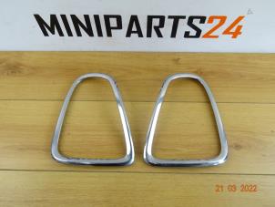 Used Taillight edging, right Mini Mini (R56) 1.6 16V Cooper Price € 59,38 Inclusive VAT offered by Miniparts24 - Miniteile24 GbR
