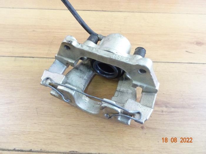 Front brake calliperholder, left from a MINI Mini Cooper S (R53)  2005