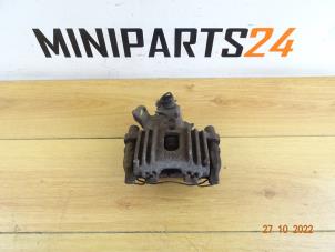 Used Rear brake calliperholder, left BMW Mini One/Cooper (R50) 1.6 16V One Price € 47,60 Inclusive VAT offered by Miniparts24 - Miniteile24 GbR