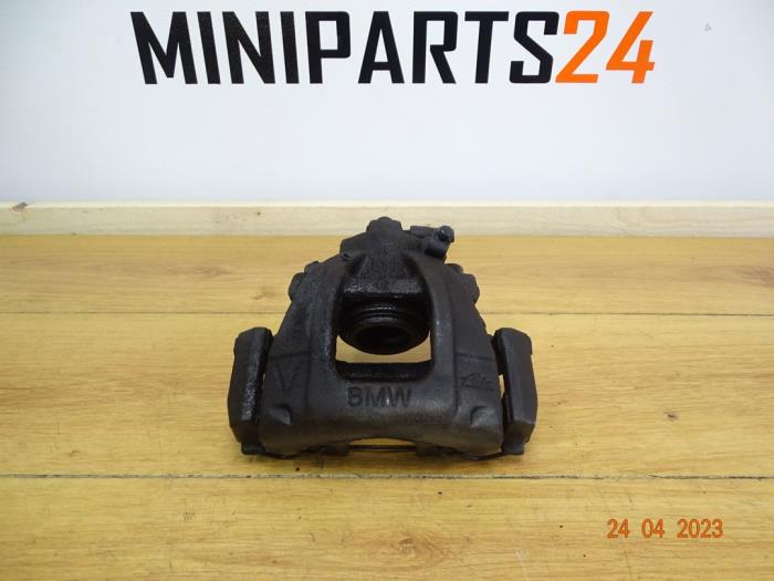 Front brake calliperholder, left from a MINI Mini Open (R52) 1.6 16V One 2004
