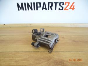 Used Rear brake calliperholder, left Austin Mini Open (R52) 1.6 16V One Price € 29,75 Inclusive VAT offered by Miniparts24 - Miniteile24 GbR
