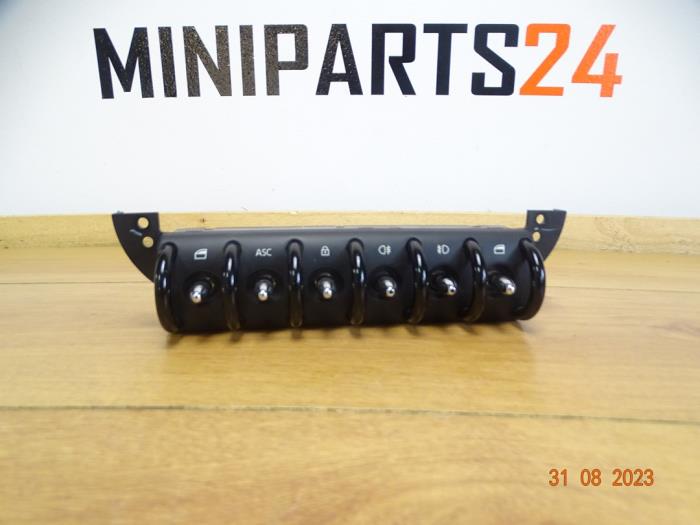 Usados Interruptor combinado de ventanillas Austin Mini Open (R52) 1.6 16V Cooper S Precio € 29,75 IVA incluido ofrecido por Miniparts24