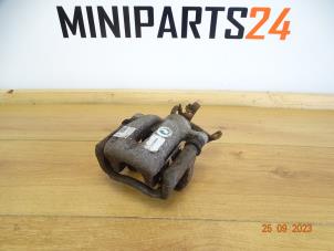 Used Rear brake calliperholder, left Mini Mini (R56) 1.6 16V Cooper S Price € 47,60 Inclusive VAT offered by Miniparts24 - Miniteile24 GbR