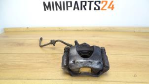 Used Front brake calliperholder, right Mini Cooper Price € 89,25 Inclusive VAT offered by Miniparts24 - Miniteile24 GbR