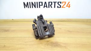Used Rear brake calliperholder, right BMW Mini One/Cooper (R50) 1.6 16V One Price € 47,60 Inclusive VAT offered by Miniparts24 - Miniteile24 GbR