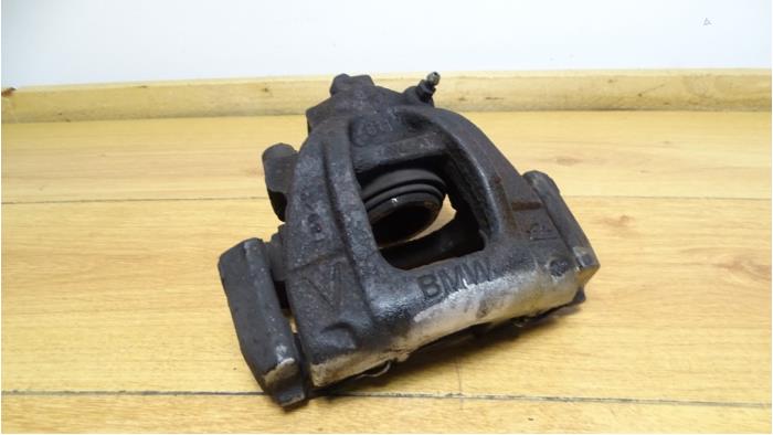 Front brake calliperholder, left from a MINI Mini Cooper S (R53) 1.6 16V 2003