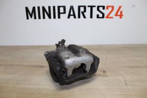 Used Rear brake calliperholder, left Mini Mini (R56) 1.4 16V One Price € 47,60 Inclusive VAT offered by Miniparts24 - Miniteile24 GbR