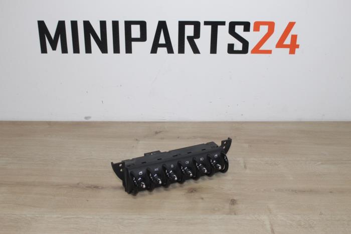 Usados Interruptor combinado de ventanillas Austin Mini Open (R52) 1.6 16V Cooper S Precio € 29,75 IVA incluido ofrecido por Miniparts24