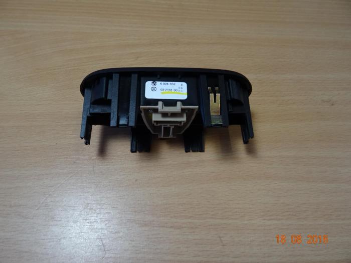 Interruptor de retrovisor de un Mini Cooper 2003