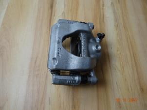 Used Front brake calliperholder, left Mini Cooper Price € 125,00 Margin scheme offered by Miniparts24 - Miniteile24 GbR