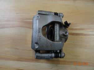 Used Front brake calliperholder, right Mini Cooper Price € 125,00 Margin scheme offered by Miniparts24 - Miniteile24 GbR
