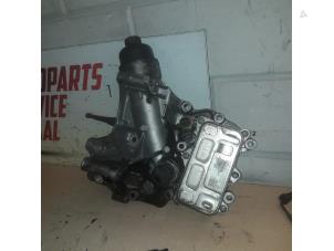 Used Oil filter housing Mercedes E (W213) E-220d 2.0 Turbo 16V 4-Matic Price € 100,00 Margin scheme offered by APST