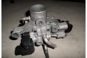 Usados Cuerpo de válvula de mariposa Daihatsu Cuore (L251/271/276) 1.0 12V DVVT Precio € 30,00 Norma de margen ofrecido por Hans Auto Onderdelen